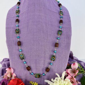 36  3/4" berry Tulasi with peacock and teal beads $70